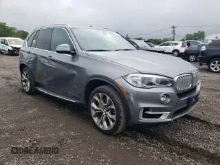 2017 BMW X5 xDrive50i with VIN 5UXKR6C30H0U13764, listed as a Copart auction lot 54575335 with 27,539 mi miles and Salvage title. Bid and sale history available at DreamBid. Image 4.