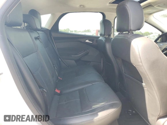 2017 Ford Focus Titanium с VIN 1FADP3N2XHL283063, выставлен на аукционе Copart как лот 54584085 с пробегом 80 822 миль миль и Списание • Salvage title. История ставок и продаж доступна на DreamBid. Изображение 10.