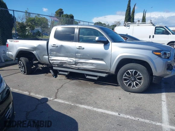 2022 Toyota Tacoma SR5 with VIN 3TMDZ5BN6NM122590, listed as a IAAI auction lot 41714578 with 56,472 mi miles and . Bid and sale history available at DreamBid. Image 13.