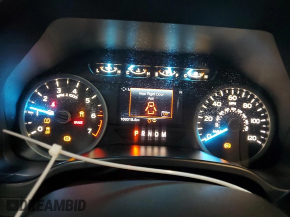 2018 Ford F-150 XL with VIN 1FTEW1E56JKE03369, listed as a Copart auction lot 42951815 with 168,518 mi miles and Salvage title. Bid and sale history available at DreamBid. Image 9.