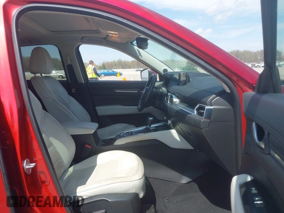 2018 Mazda CX-5 Grand Touring with VIN JM3KFBDM6J0424663, listed as a IAAI auction lot 42003207 with 95,442 mi miles and . Bid and sale history available at DreamBid. Image 5.