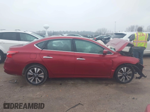 2019 Nissan Sentra S z VIN 3N1AB7AP7KY256134, wystawiony jako IAAI lot #41512289 z przebiegiem Nie podano mil oraz . Historia ofert i sprzedaży dostępna na DreamBid. Obrazek 14.