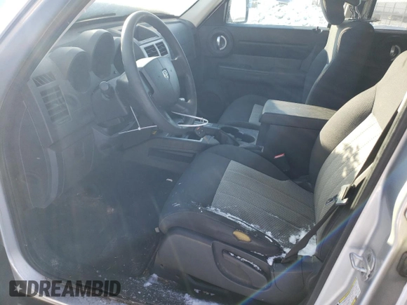 2010 Dodge Nitro Heat with VIN 1D4PU4GK5AW175296, listed as a Copart auction lot 87819235 with 168,542 mi miles and Clean title. Bid and sale history available at DreamBid. Image 7.