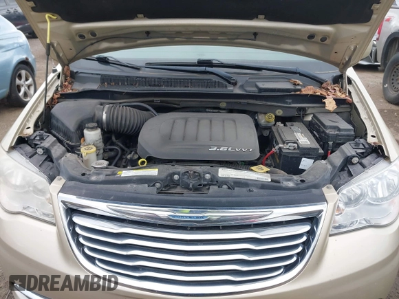 2011 Chrysler Town & Country Touring with VIN 2A4RR5DGXBR666934, listed as a IAAI auction lot 42022807 with 125,920 mi miles and . Bid and sale history available at DreamBid. Image 10.