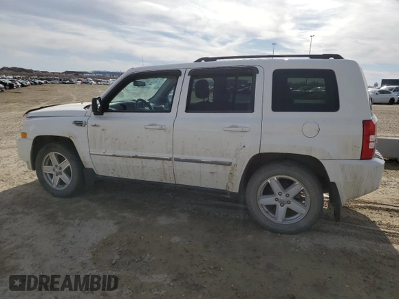 2010 Jeep Patriot Sport with VIN 1J4NF2GB2AD525475, listed as a Copart auction lot 51986785 with 90,659 mi miles and Salvage Title. Bid and sale history available at carsss.com. Image 2.