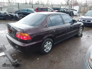 2000 Honda Civic EX with VIN 1HGEJ8644YL037589, listed as a IAAI auction lot 41891907 with 127,086 mi miles. Bid and sale history available at carsss.com. Image 4.