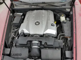 2005 Cadillac XLR z VIN 1G6YV34A855601016, wystawiony jako Copart lot #74436784 z przebiegiem Nie podano mil oraz Szkody całkowita. Historia ofert i sprzedaży dostępna na DreamBid. Obrazek 11.