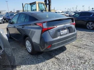 2022 Toyota Prius L Eco with VIN JTDKAMFU3N3174447, listed as a IAAI auction lot 41835177 with 56,559 mi miles. Bid and sale history available at carsss.com. Image 3.