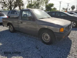 1995 Isuzu Pickup S z VIN JAACL11L8S7200788, wystawiony jako Copart lot #51145765 z przebiegiem 328 108 mil mil oraz Tytuł czysty. Historia ofert i sprzedaży dostępna na DreamBid. Obrazek 4.