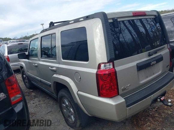 2007 Jeep Commander Sport z VIN 1J8HG48P47C672667, wystawiony jako IAAI lot #40423450 z przebiegiem 230 823 mil mil oraz . Historia ofert i sprzedaży dostępna na DreamBid. Obrazek 3.