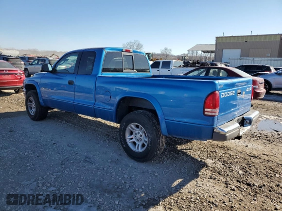 2001 Dodge Dakota SLT with VIN 1B7GG22X01S283618, listed as a Copart auction lot 42608555 with 142,307 mi miles and Salvage Title. Bid and sale history available at DreamBid. Image 2.