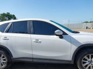 2015 Mazda CX-5 Sport with VIN JM3KE2BE6F0541469, listed as a IAAI auction lot 42632906 with 166,257 mi miles and . Bid and sale history available at DreamBid. Image 13.