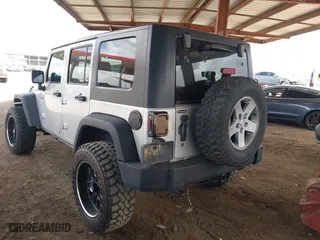 2010 Jeep Wrangler Unlimited Sport with VIN 1J4BA3H18AL161243, listed as a IAAI auction lot 41960370 with 89,004 mi miles. Bid and sale history available at carsss.com. Image 3.