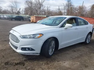 2014 Ford Fusion SE with VIN 3FA6P0H95ER361049, listed as a IAAI auction lot 41864864 with 210,229 mi miles. Bid and sale history available at carsss.com. Image 2.
