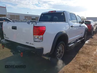 2012 Toyota Tundra 4WD Truck with VIN 5TFDW5F10CX241968, listed as a IAAI auction lot 41858300 with 272,634 mi miles. Bid and sale history available at carsss.com. Image 4.