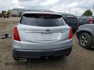 2018 Cadillac XT5 FWD z VIN 1GYKNARS0JZ110512, wystawiony jako Copart lot #64165275 z przebiegiem 98 504 mil mil oraz Czysty tytuł • Clean title. Historia ofert i sprzedaży dostępna na DreamBid. Obrazek 6.