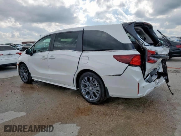 2025 Honda Odyssey Touring with VIN 5FNRL6H88SB001428, listed as a Copart auction lot 53836615 with 14,580 mi miles and Salvage title. Bid and sale history available at DreamBid. Image 2.