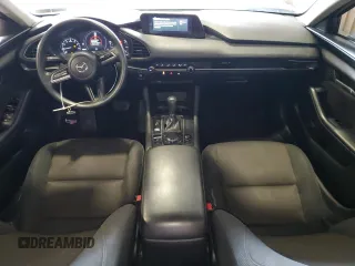 2019 Mazda 3 z VIN 3MZBPABL4KM114291, wystawiony jako Copart lot #57652945 z przebiegiem 148 644 mil mil oraz Szkoda całkowita • Salvage title. Historia ofert i sprzedaży dostępna na DreamBid. Obrazek 8.