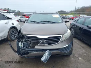 2011 Kia Sportage LX with VIN KNDPB3A20B7024111, listed as a IAAI auction lot 41945892 with 139,605 mi miles and . Bid and sale history available at carsss.com. Image 13.
