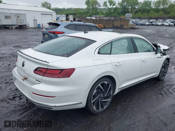 2023 Volkswagen Arteon SEL Premium R-Line z VIN WVWTR7AN4PE014292, wystawiony jako IAAI lot #42331800 z przebiegiem 6 389 mil mil oraz . Historia ofert i sprzedaży dostępna na DreamBid. Obrazek 4.