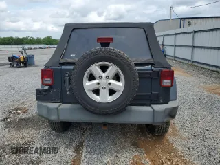 2007 Jeep Wrangler Unlimited X with VIN 1J4GA39117L119395, listed as a Copart auction lot 52588055 with 160,335 mi miles and Salvage title. Bid and sale history available at DreamBid. Image 6.