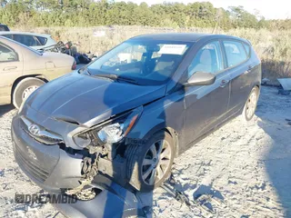 2012 Hyundai Accent SE with VIN KMHCU5AE6CU024465, listed as a IAAI auction lot 41591162 with 168,574 mi miles. Bid and sale history available at carsss.com. Image 2.