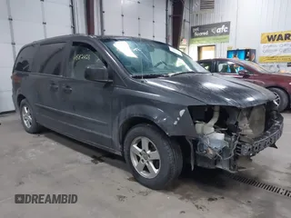 2012 Dodge Grand Caravan SXT with VIN 2C4RDGCG7CR358266, listed as a IAAI auction lot 41582428 with 169,137 mi miles and . Bid and sale history available at DreamBid. Image 1.
