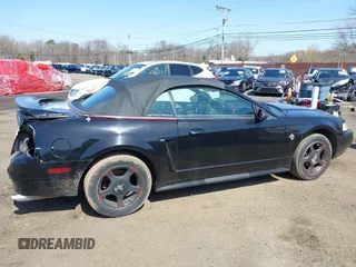 2000 Ford Mustang with VIN 1FAFP444XYF181018, listed as a IAAI auction lot 41943486 with 212,996 mi miles. Bid and sale history available at carsss.com. Image 17.