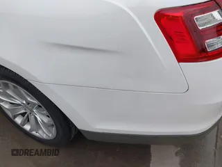 2013 Ford Taurus Limited с VIN 1FAHP2F85DG177024, выставлен на аукционе IAAI как лот 42374078 с пробегом 142 291 миль миль и . История ставок и продаж доступна на DreamBid. Изображение 12.