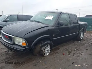 2003 GMC Sonoma SLS with VIN 1GTDT13X63K182058, listed as a IAAI auction lot 41455779 with 186,503 mi miles. Bid and sale history available at carsss.com. Image 2.