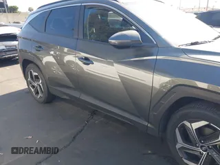 2022 Hyundai Tucson SEL z VIN 5NMJF3AE6NH133724, wystawiony jako IAAI lot #42309502 z przebiegiem 49 156 mil mil oraz . Historia ofert i sprzedaży dostępna na DreamBid. Obrazek 13.
