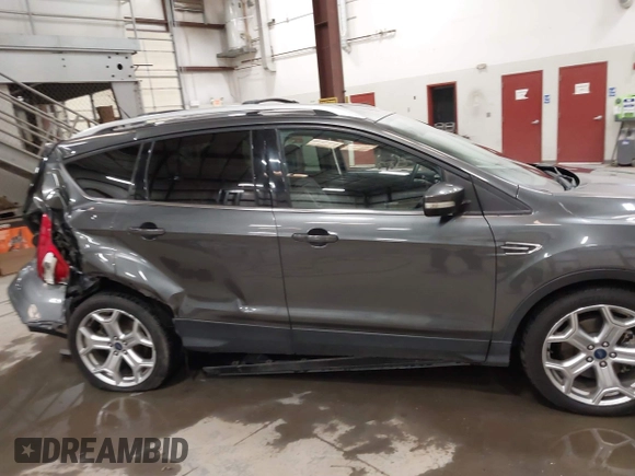 2019 Ford Escape Titanium with VIN 1FMCU9J91KUB11957, listed as a IAAI auction lot 41928264 with 72,460 mi miles. Bid and sale history available at carsss.com. Image 14.