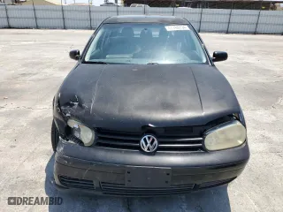 2003 Volkswagen Golf GLS with VIN 9BWGK61J334073949, listed as a Copart auction lot 64709734 with 186,113 mi miles and Salvage Title. Bid and sale history available at carsss.com. Image 5.