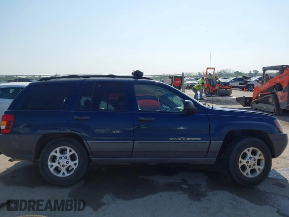 2000 Jeep Grand Cherokee Laredo with VIN 1J4G248S5YC413977, listed as a IAAI auction lot 42045808 with Not provided miles and . Bid and sale history available at DreamBid. Image 13.