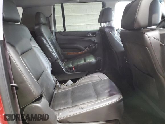2015 Chevrolet Suburban LTZ with VIN 1GNSKKKC7FR299567, listed as a Copart auction lot 52944035 with 147,964 mi miles and Salvage Title. Bid and sale history available at DreamBid. Image 11.