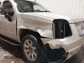 2014 GMC Yukon Denali with VIN 1GKS2EEF0ER134804, listed as a IAAI auction lot 41582709 with 142,192 mi miles. Bid and sale history available at carsss.com. Image 6.