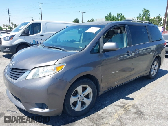 2011 Toyota Sienna LE AAS with VIN 5TDKK3DC4BS056872, listed as a IAAI auction lot 42643417 with 170,266 mi miles and . Bid and sale history available at DreamBid. Image 18.