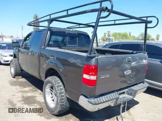 2005 Ford F-150 XLT with VIN 1FTPW14595FB23003, listed as a IAAI auction lot 41881364 with 228,464 mi miles. Bid and sale history available at carsss.com. Image 3.