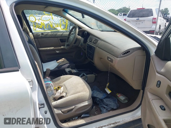 2005 Ford Taurus SE with VIN 1FAFP53255A304254, listed as a IAAI auction lot 42647002 with Not provided miles and . Bid and sale history available at DreamBid. Image 5.