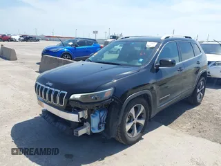 2019 Jeep Cherokee Limited z VIN 1C4PJLDB5KD469816, wystawiony jako IAAI lot #42245187 z przebiegiem 50 387 mil mil oraz . Historia ofert i sprzedaży dostępna na DreamBid. Obrazek 18.