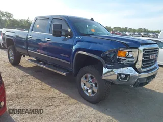 2016 GMC Sierra 2500HD SLT z VIN 1GT12TE84GF246538, wystawiony jako IAAI lot #42075327 z przebiegiem 89 341 mil mil oraz . Historia ofert i sprzedaży dostępna na DreamBid. Obrazek 1.