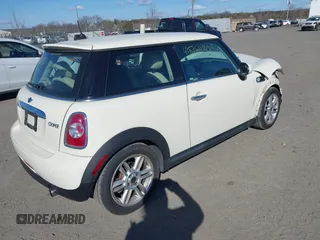 2012 MINI Hardtop with VIN WMWSU3C59CT255588, listed as a IAAI auction lot 41878430 with 103,033 mi miles and . Bid and sale history available at DreamBid. Image 4.