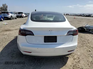 2021 Tesla Model 3 Standard Range Plus with VIN 5YJ3E1EA1MF871986, listed as a Copart auction lot 53389475 with Not Provided miles and Salvage Title. Bid and sale history available at DreamBid. Image 6.