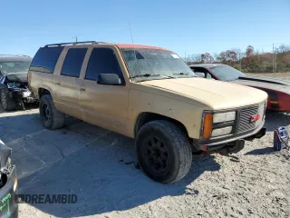 1994 GMC Suburban z VIN 1GKFK16K0RJ751324, wystawiony jako Copart lot #77827404 z przebiegiem 219 786 mil mil oraz Szkoda całkowita • Salvage title. Historia ofert i sprzedaży dostępna na DreamBid. Obrazek 4.