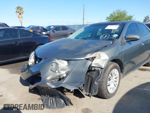 2014 Toyota Camry L with VIN 4T1BF1FK7EU731591, listed as a IAAI auction lot 41917728 with 85,504 mi miles. Bid and sale history available at carsss.com. Image 6.