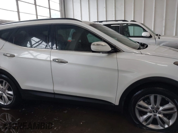 2013 Hyundai Santa Fe Sport z VIN 5XYZU3LAXDG030267, wystawiony jako IAAI lot #42233463 z przebiegiem 146 078 mil mil oraz . Historia ofert i sprzedaży dostępna na DreamBid. Obrazek 13.