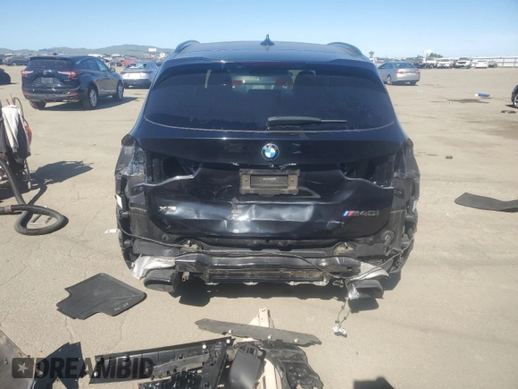 2020 BMW X3 M40i with VIN 5UXTY9C01L9B03869, listed as a Copart auction lot 46637515 with 57,052 mi miles and Salvage Title. Bid and sale history available at DreamBid. Image 6.