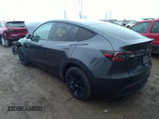 2024 Tesla Model Y Long Range z VIN 7SAYGDEE7RA214802, wystawiony jako IAAI lot #41118623 z przebiegiem 12 336 mil mil oraz . Historia ofert i sprzedaży dostępna na DreamBid. Obrazek 3.