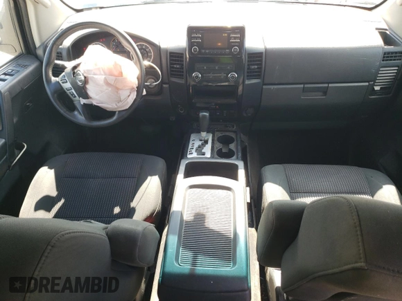 2014 Nissan Titan SV with VIN 1N6BA0ED0EN517002, listed as a Copart auction lot 57885435 with 139,910 mi miles and Salvage title. Bid and sale history available at DreamBid. Image 8.