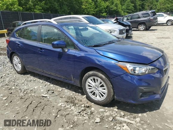 2018 Subaru Impreza Premium with VIN 4S3GTAD69J3718625, listed as a Copart auction lot 56623915 with 71,129 mi miles and Salvage title. Bid and sale history available at DreamBid. Image 4.
